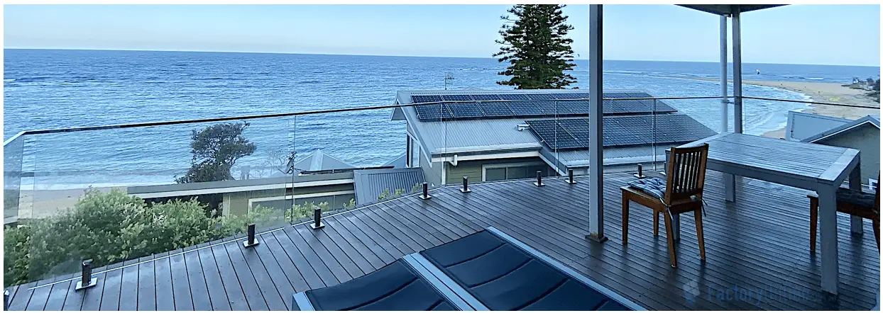 Glass balustrade balcony project in Sydney & Brisbane showing modern frameless glass panels with stainless steel spigots